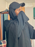 Black cap with attached chiffon hijab