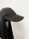 Black cap with attached chiffon hijab